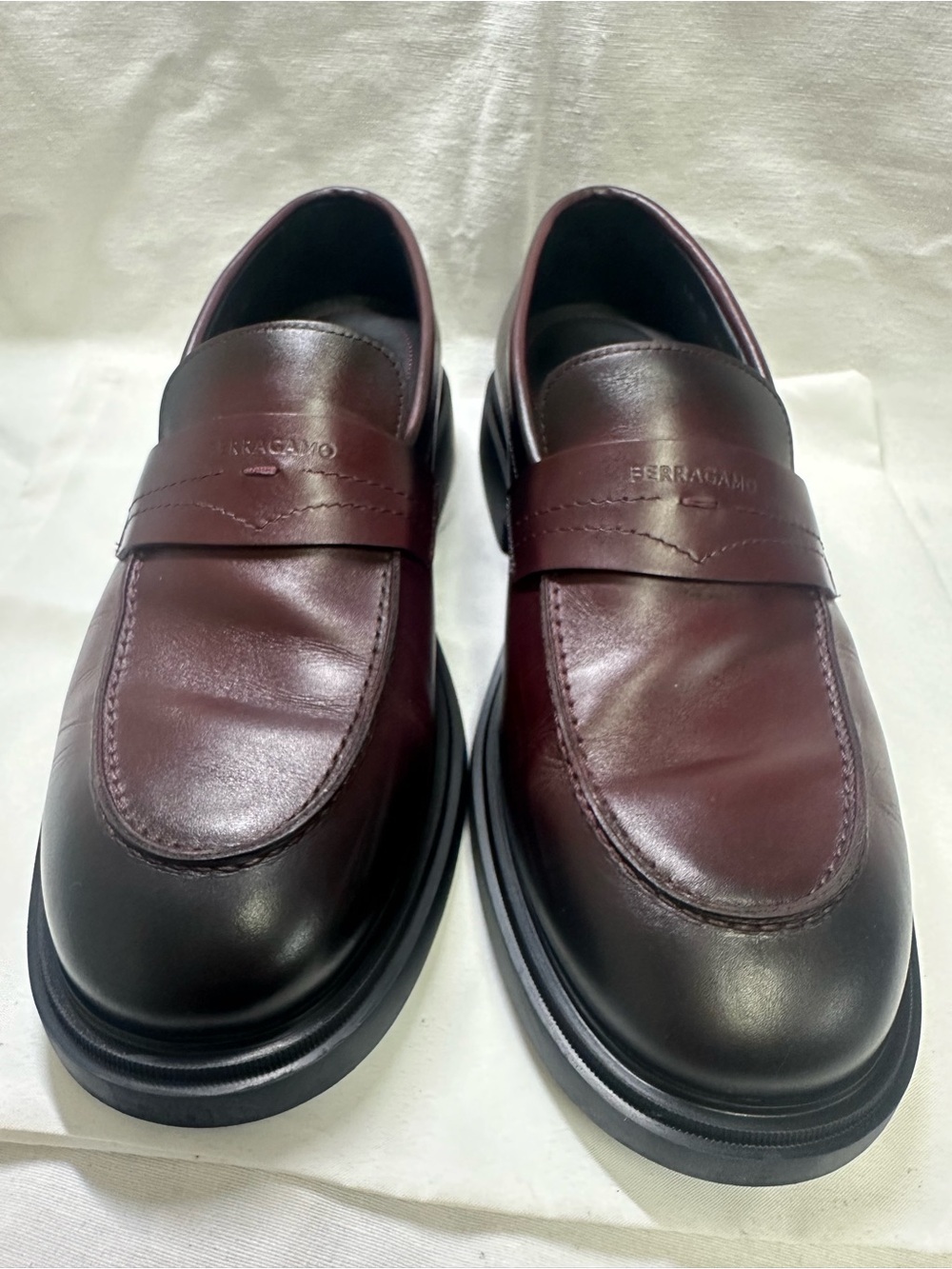 Salvatore Ferragamo Men’s Burgundy Leather Penny Loafers with Black Soles